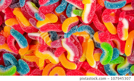 lots of colorful gummies 107945307