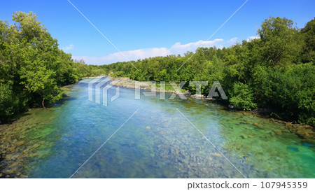 A beautiful river with clear water A beautiful river with clear water 107945359