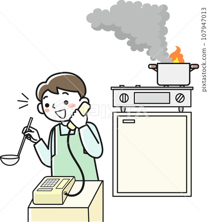 一個男人拿著火上的鍋子打電話 107947013