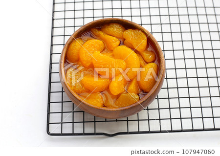 Mandarin orange in sweet syrup Mandarin orange in sweet syrup 107947060