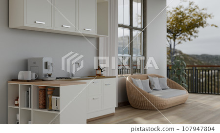 A modern, minimalist apartment studio with a small kitchen, a small living room space and a balcony. A modern, minimalist apartment studio with a small kitchen, a small living room space and a balcony. 107947804