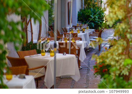 Table set for an event party or wedding reception in a restaurant. 107949993