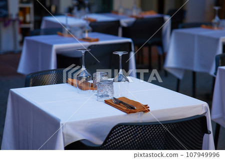 Table set for an event party or wedding reception in a restaurant. 107949996