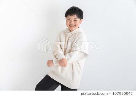 boy smiling and dancing 107950045
