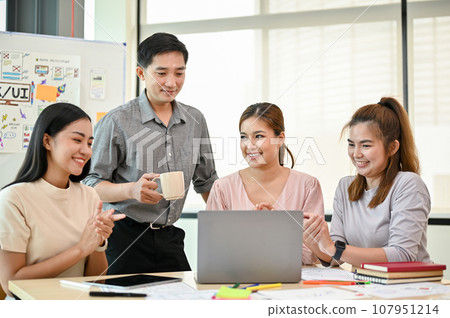 A group of professional Asian tech developers is in the meeting, discussing work 107951214