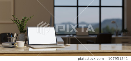 Blank screen mock up laptop computer on the table with copy space, study room background. Blank screen mock up laptop computer on the table with copy space, study room background. 107951241