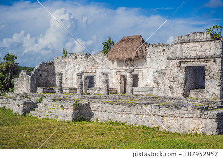 Pre-Columbian Mayan walled city of Tulum, Quintana Roo, Mexico, North America, Tulum, Mexico. El Castillo - castle the Mayan city of Tulum main temple Pre-Columbian Mayan walled city of Tulum, Quintana Roo, Mexico, North America, Tulum, Mexico. El Castillo - castle the Mayan city of Tulum main temple 107952957