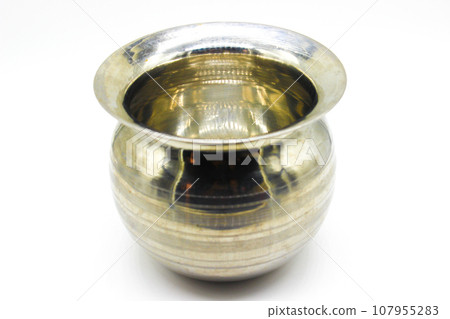 Stainless Steel Lota on white background with selective focus Stainless Steel Lota on white background with selective focus 107955283