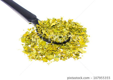 kasuri methi on white background with selective focus kasuri methi on white background with selective focus 107955355