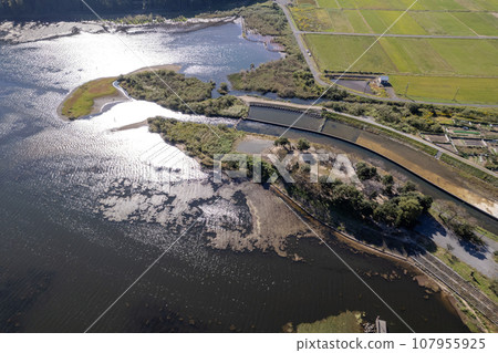Drone photography | Aerial shot of refreshing blue sky and Shiotsuhama Ryokuchi Park north of Lake Biwa | Rural scenery | Nagahama City, Shiga Prefecture Drone photography | Aerial shot of refreshing blue sky and Shiotsuhama Ryokuchi Park north of Lake Biwa | Rural scenery | Nagahama City, Shiga Prefecture 107955925