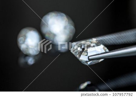 Diamonds on black background Diamonds on black background 107957792