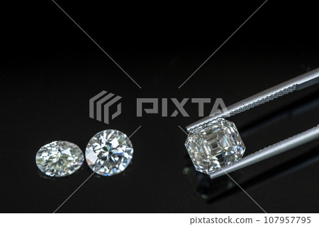 Diamonds on black background Diamonds on black background 107957795
