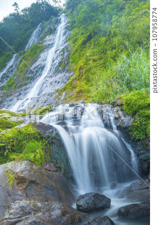 The photo of the Air Terjun Sikarim waterfall in Dieng, Indonesia. The photo of the Air Terjun Sikarim waterfall in Dieng, Indonesia. 107958774