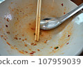 The Empty blow after eating finished. empty blow with chopstick. 107959039
