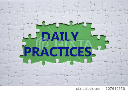 Daily Practices symbol. White puzzle with words Daily Practices. Beautiful green background. Psychology and Daily Practices concept. Copy space. 107959650