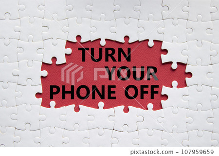 Turn Your Phone off symbol. White puzzle with words Turn Your Phone off. Beautiful red background. Business concept. Copy space. 107959659