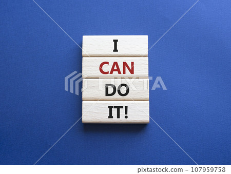 I can do it symbol. Concept words I can do it on wooden blocks. Beautiful deep blue background. Business and I can do it concept. Copy space. I can do it symbol. Concept words I can do it on wooden blocks. Beautiful deep blue background. Business and I can do it concept. Copy space. 107959758