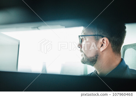 Remote work and modrn conectivity. Virtual meeting with many participents online. Webinar. Businessman talking online with employees via video connection Remote work and modrn conectivity. Virtual meeting with many participents online. Webinar. Businessman talking online with employees via video connection 107960468