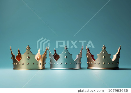 Three crowns as a symbol of the celebration of the Day of the Three Kings 107963686