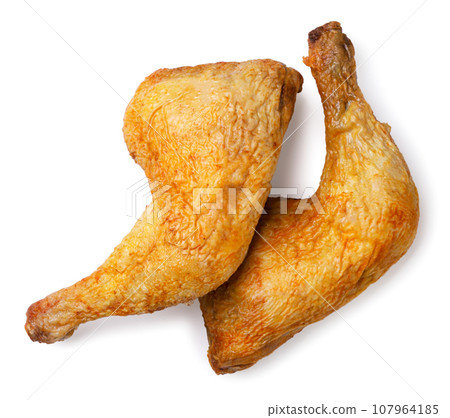 Fried chicken legs on a white background. Top view 107964185