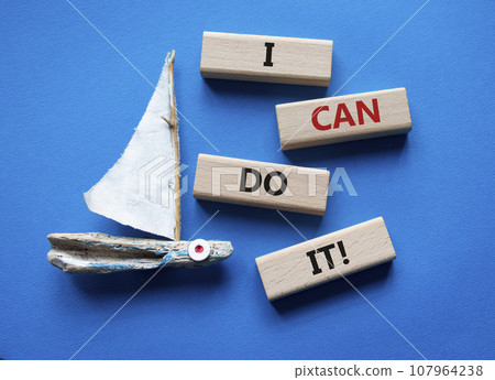 I can do it symbol. Concept words I can do it on wooden blocks. Beautiful blue background with boat. Business and I can do it concept. Copy space. 107964238