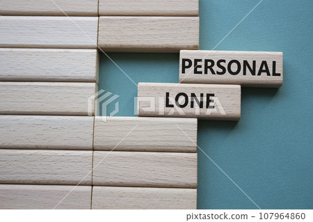 Personal Loan symbol. Concept word Personal Loan on wooden blocks. Beautiful grey green background. Business and Personal Loan concept. Copy space 107964860