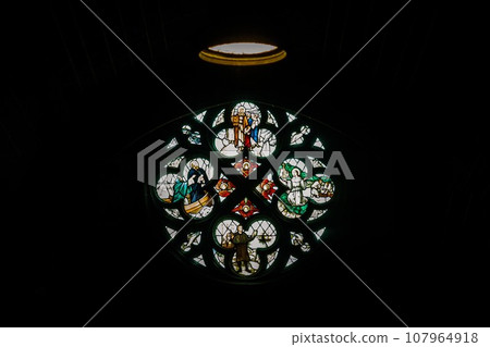 Silhouette of Stained glass window, Pattern of Medieval gothic rose window in Liverpool cathedral. Silhouette of Stained glass window, Pattern of Medieval gothic rose window in Liverpool cathedral. 107964918