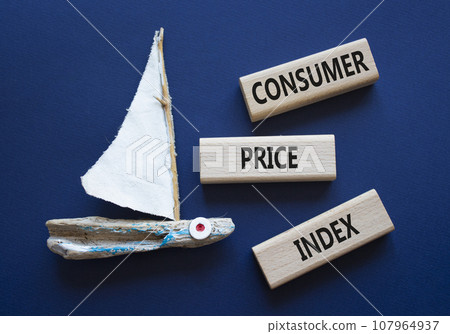 Consumer Price Index symbol. Concept words Consumer Price Index on wooden blocks. Beautiful deep blue background with boat. Business and Consumer Price Index concept. Copy space. Consumer Price Index symbol. Concept words Consumer Price Index on wooden blocks. Beautiful deep blue background with boat. Business and Consumer Price Index concept. Copy space. 107964937