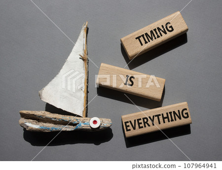 Timing is Everything symbol. Wooden blocks with words Timing is Everything. Beautiful grey background with boat. Business and Timing is Everything concept. Copy space. Timing is Everything symbol. Wooden blocks with words Timing is Everything. Beautiful grey background with boat. Business and Timing is Everything concept. Copy space. 107964941