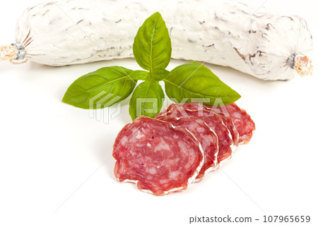 Salami sliced on the white background Salami sliced on the white background 107965659