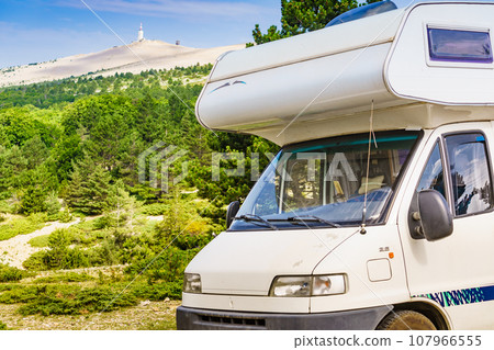 Caravan in mountains. Mont Ventoux in the distance. Provance 107966555