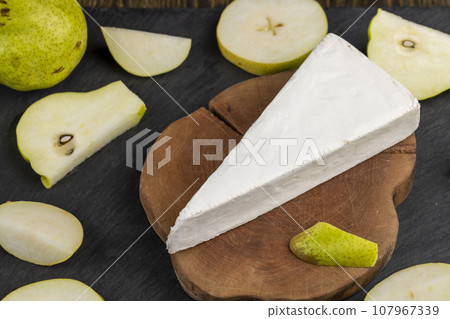 cheese with white mold cut into chunks cheese with white mold cut into chunks 107967339