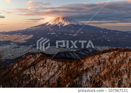 Mt. Fuji at sunrise covered in clouds seen from Mitsutoge 107967531
