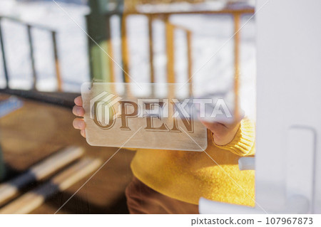 sign on door with inscription open or closed. wooden sign on door of restaurant or coffee shop 107967873