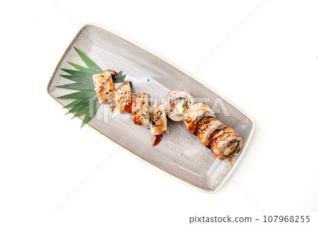 American Canada sushi rolls with unagi and salmon isolated American Canada sushi rolls with unagi and salmon isolated 107968255