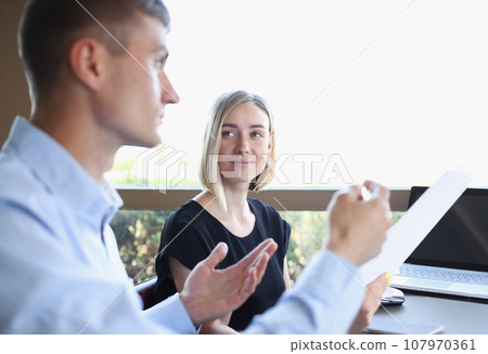 Businessman explains the policy of the enterprise 107970361