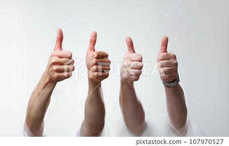A group of people male hands on a gray A group of people male hands on a gray 107970527