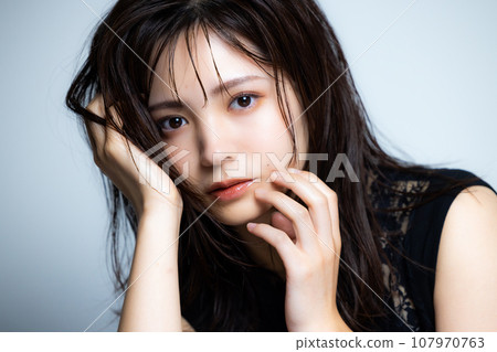 Black sleeveless woman Black sleeveless woman 107970763