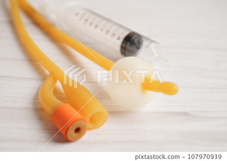 Foley catheter and urine drainage bag collect urine for disability or patient in hospital. 107970939