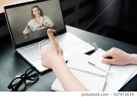 Virtual Connections. Woman Engages in Online Discussion, Work from Home, Freelance, Video 107973614