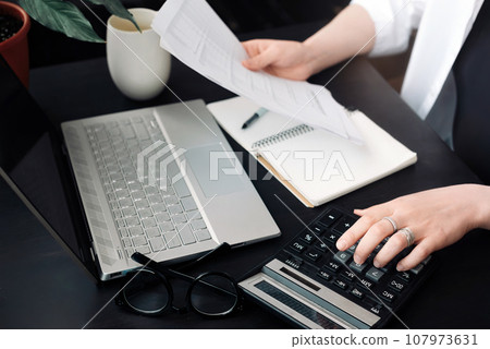 Successful Financial Planning: Businesswoman in Accounting. Close-Up of Accountant at Work. Document Successful Financial Planning: Businesswoman in Accounting. Close-Up of Accountant at Work. Document 107973631