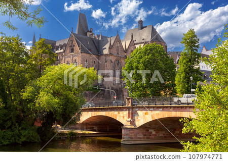 View of the old university in Marburg on a sunny morning. View of the old university in Marburg on a sunny morning. 107974771
