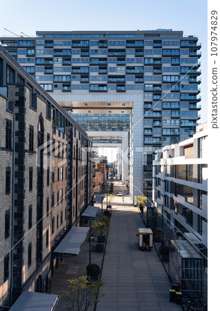 Cologne Kranhaus is a modern business center on the bank of Rhine river, Cologne, Germany 107974829