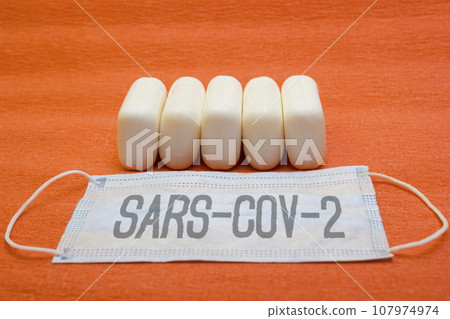 Many pieces soap and mask - protection, coronavirus, covid19, lettering sars-cov-2 Many pieces soap and mask - protection, coronavirus, covid19, lettering sars-cov-2 107974974