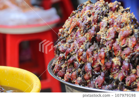 Closeup of Vietnamese fermented fiddler crab claws sauce sale in An Giang Province 107979198
