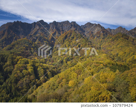 Shinazawa Plateau, Togakushi Nishidake Mountain Range and spectacular autumn leaves in Nagano City, Nagano Prefecture (aerial shot by drone) Shinazawa Plateau, Togakushi Nishidake Mountain Range and spectacular autumn leaves in Nagano City, Nagano Prefecture (aerial shot by drone) 107979424