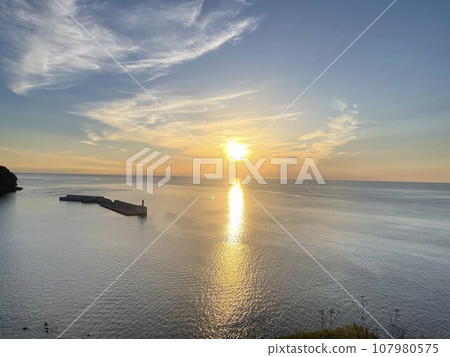 Sunset over the sea from Oronko Rock Sunset over the sea from Oronko Rock 107980575