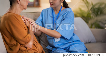Empathy, trust and nurse caregiver holding hands with patient. consulting support and healthcare advice. Kindness, counseling and medical therapy in nursing home for hope, consultation and psychology 107980910