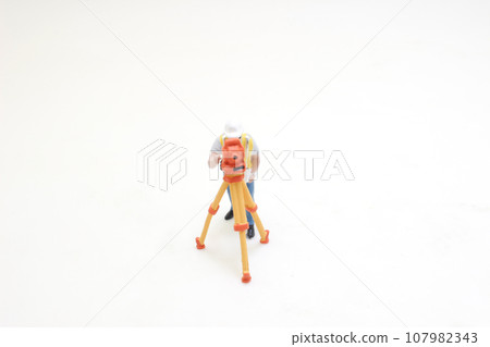 the figure of Surveyor at the construction site 107982343