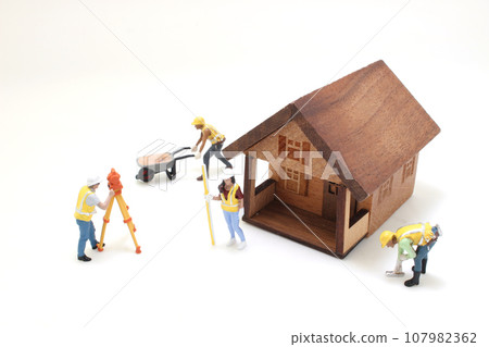 the figure of Surveyor at the construction site 107982362